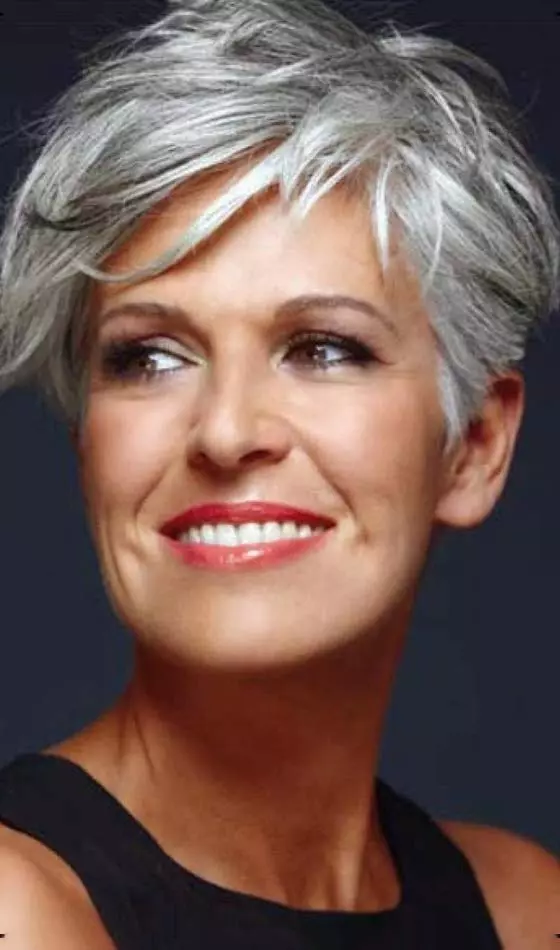 Platinum tousled short hairdo with bangs hairstyle for women over 50