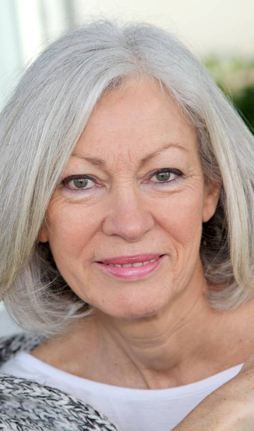 White bob with bangs hairstyle for women over 50