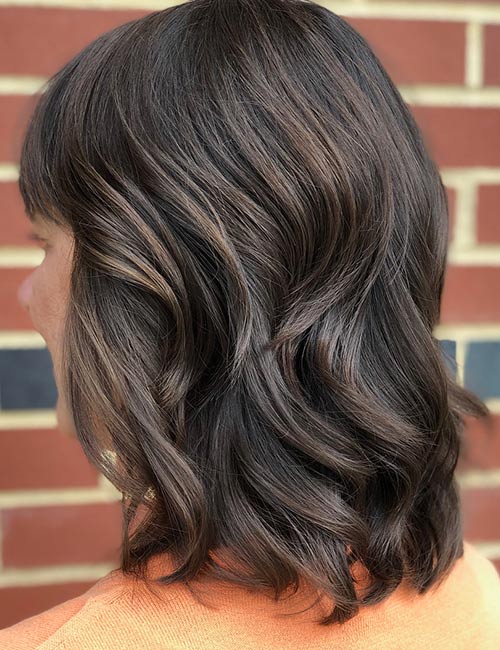 Brown lob with highlights hairstyle for thick hair