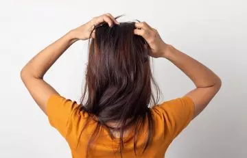 How to apply oil on hair step 4