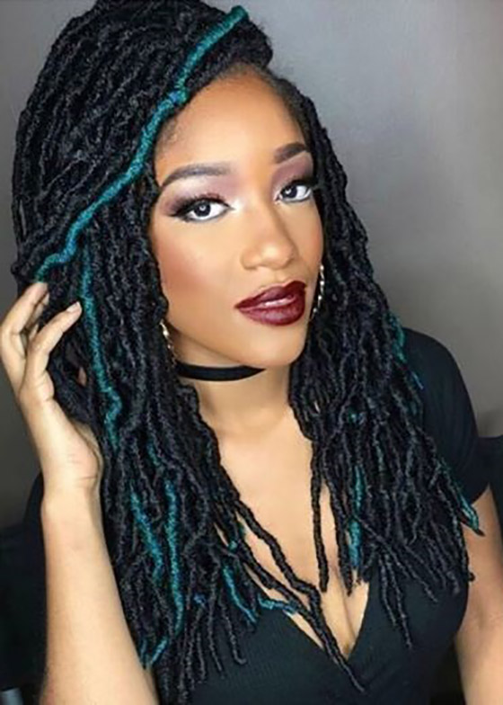 Nu locs with teal accents crochet braids