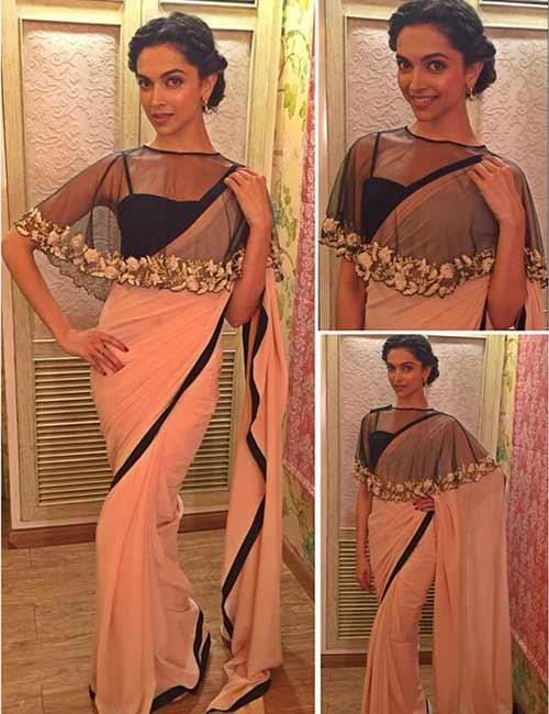 Kajal Aggarwal shines in her heavy embellished gold saree and plunge neck blouse  design