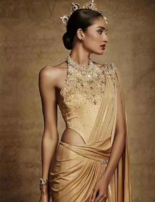 Embellished gold swimsuit style blouse design for satin sarees