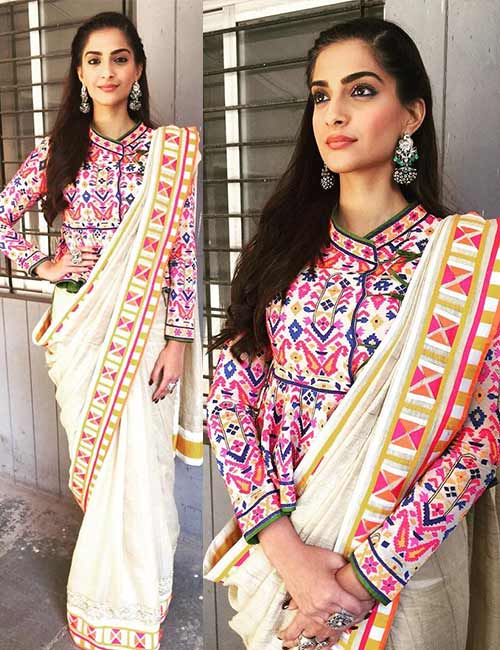 Peplum shirt style full sleeved Kutch saree blouse design