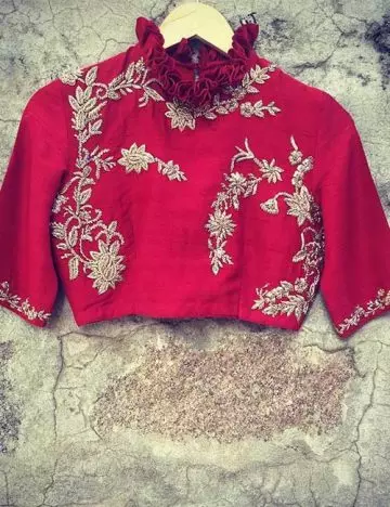 Silk red and golden embroidery ruffled neck saree blouse design