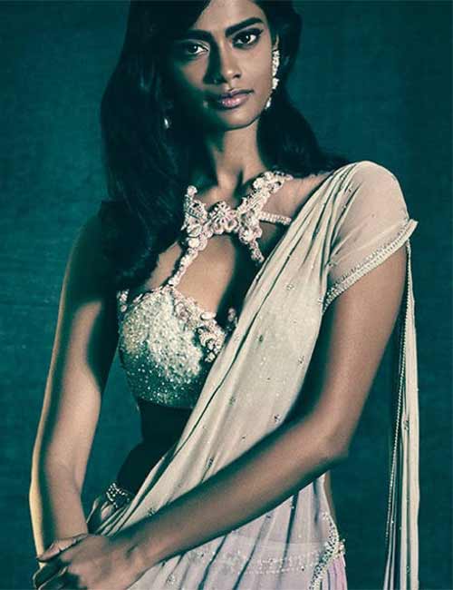 Rhinestone bodice and lace embellished halter strap style saree blouse design