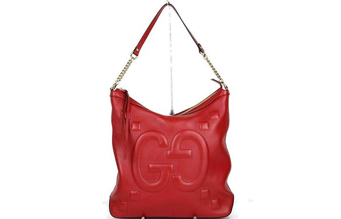 12. Gucci Leather Embossed Hobo Chain Bag