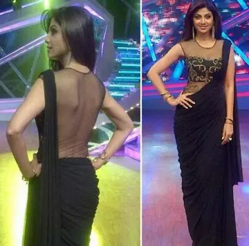 Shilpa Shetty in a black chiffon premade saree with a sheer tulle and gold emboridery blouse