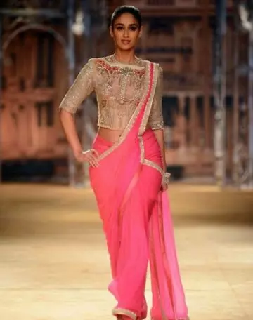 Ileana D'Cruz with a glossy pink lace and georgette saree with sequin blouse