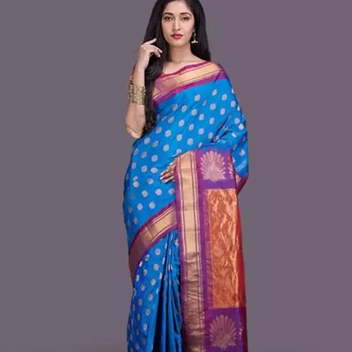 Ice blue and purple paithani saree with peacock design for wedding