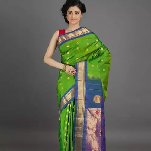 Parrot green and powdered blue polka dots design paithani saree for wedding