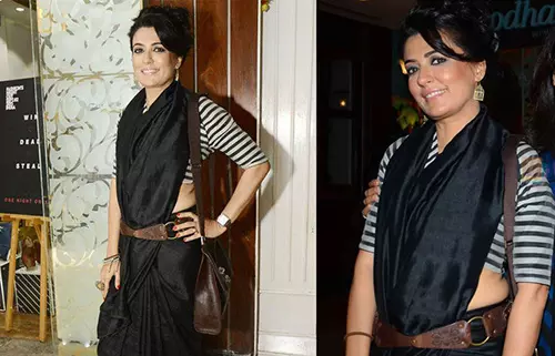 Mini Mathur in a pure black chiffon belted saree with zebra stries blouse