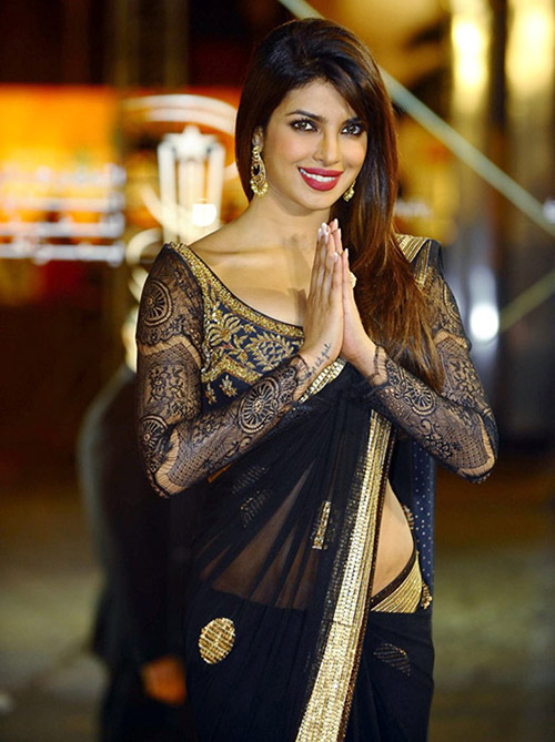 Priyanka Chopra in a royal blue georgette saree with velvet blouse in intricate lace embroidery