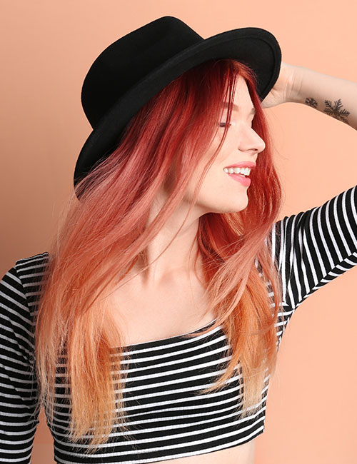 A breathtaking fiery sunset ombre on feathered ends
