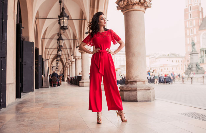 A model wearing red culotte jumpsuits