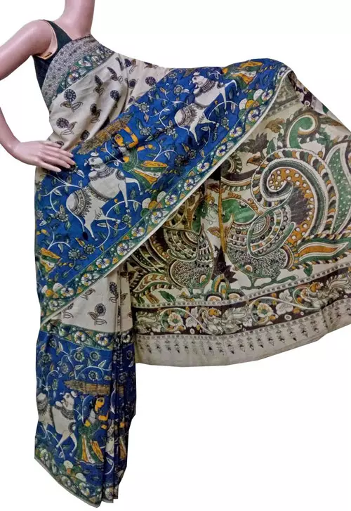 Beige and blue Kalamkari saree with peacock pallu