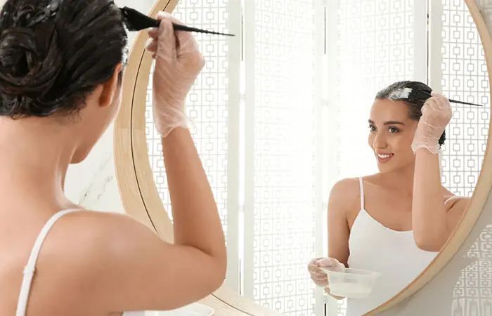 A woman coloring her hair