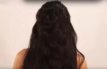 Step 6 of half bun hairstyle