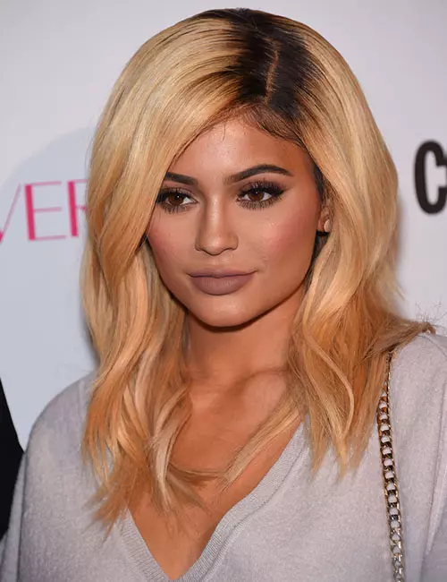 Kylie Jenner relaxed golden blonde waves hairstyle