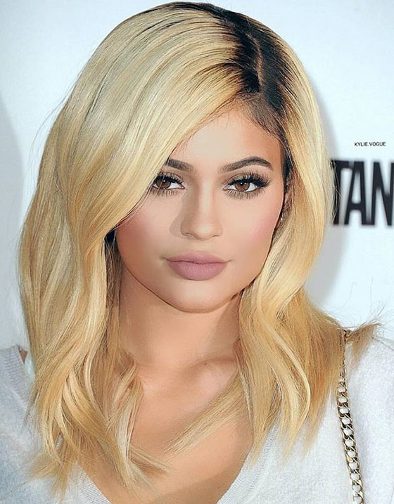 Kylie Jenner relaxed golden blonde waves hairstyle