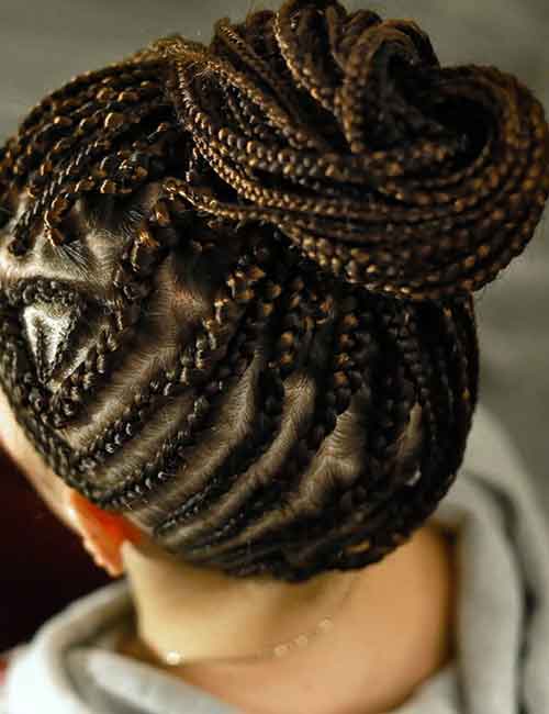 Side parted goddess braids bun hairstyle