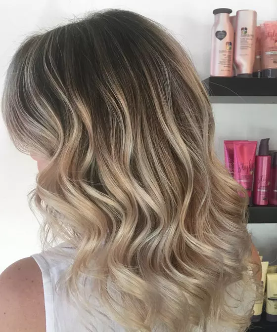 Ash blonde babylights creates movement when combined with warm and cool tones