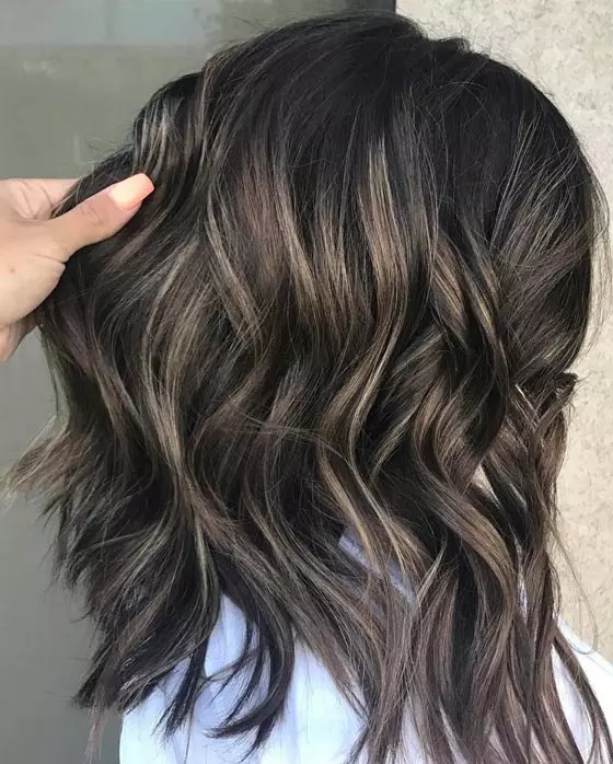 Ash blonde hair color highlights complement cool toned coffee brown hair