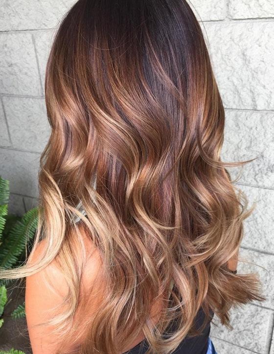 Auburn honey blonde balayage hair color idea