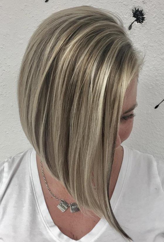 Long angled bob with bright ash blonde highlights