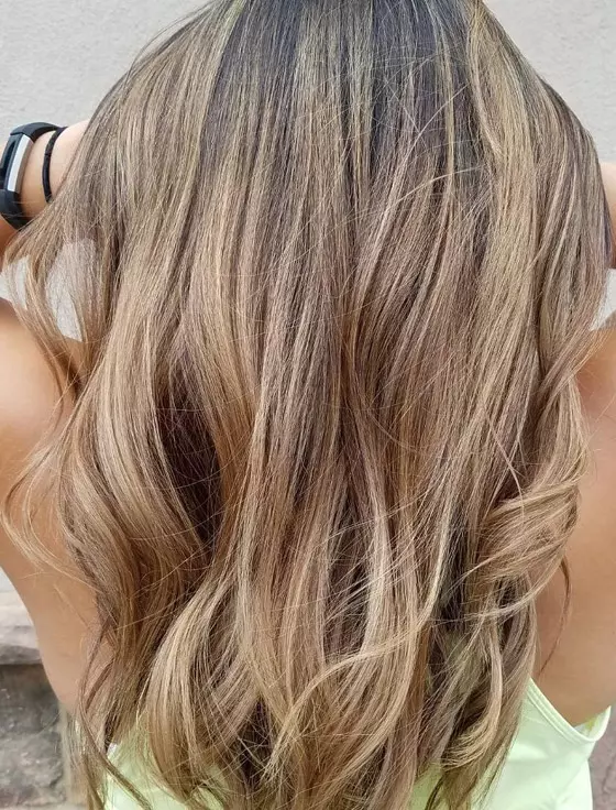 Dark honey blonde hair color idea for a sexy look
