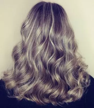 Gray balayage over medium ash blonde hair color creates a stunning look