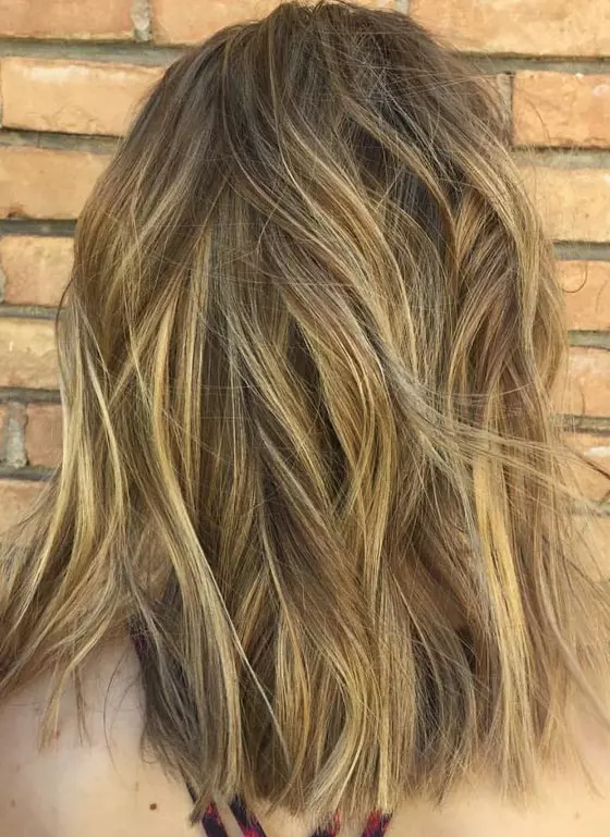 Honey blonde shadow root hair color
