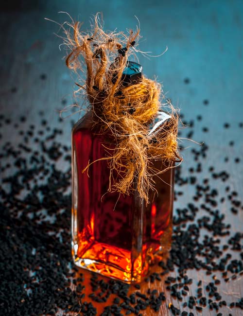 16 Black Seed Oil Benefits | Hair, Skin & Health | Holland & Barrett
