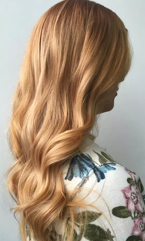 Molten gold strawberry blonde hair color