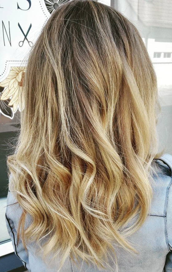 Pale honey blonde hair color idea for a royal look
