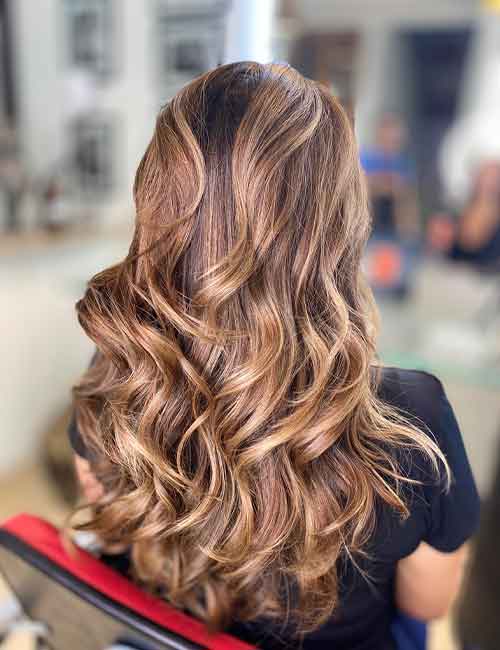 Rose gold hair with caramel highlights