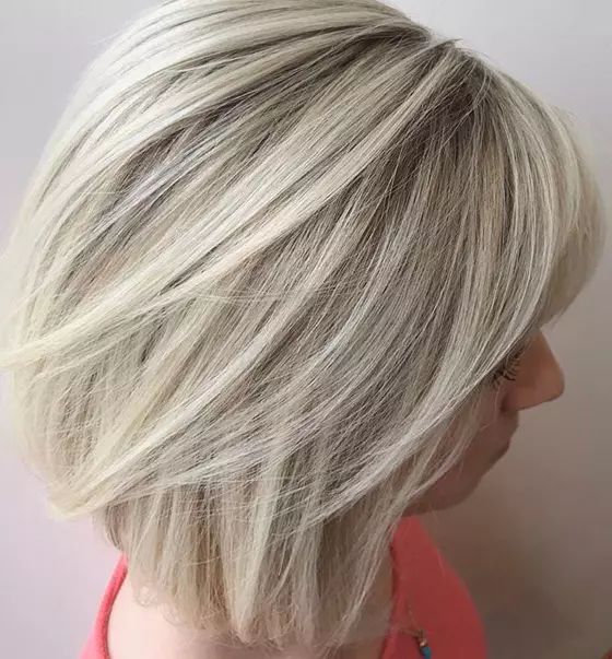 Straight short bob in solid ash blonde hair color
