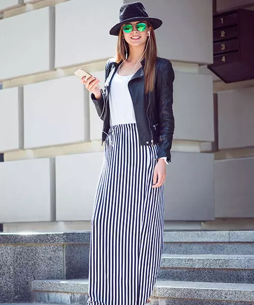 Pair your vertical striped maxi skirt with a jacket