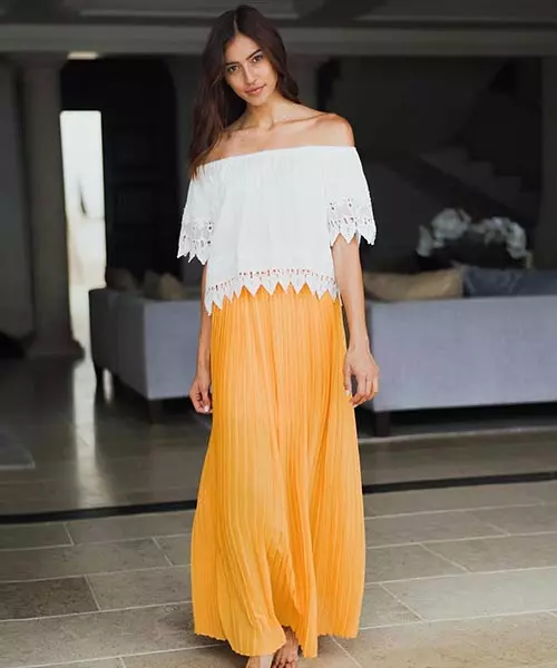 Wear your pleated maxi skirt with a white lace top