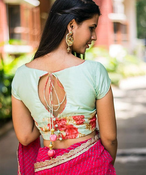 Drop-shaped blouse back neck designs with dori and tassels