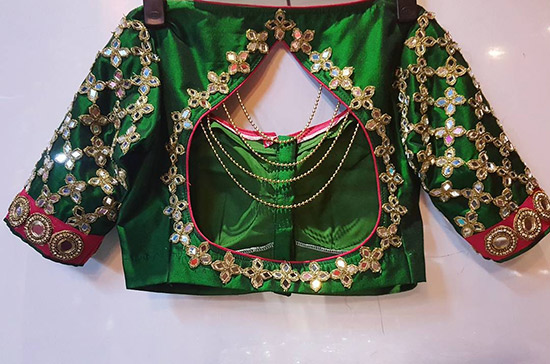 Pattu saree blouse design with gold kundan and mirror work