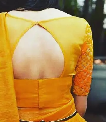 Pattu saree blouse design with pot neck and open back