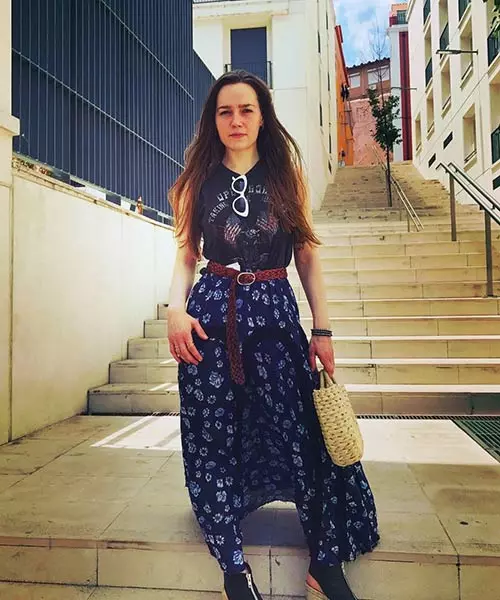 Wear your blue printed maxi skirt with a belt