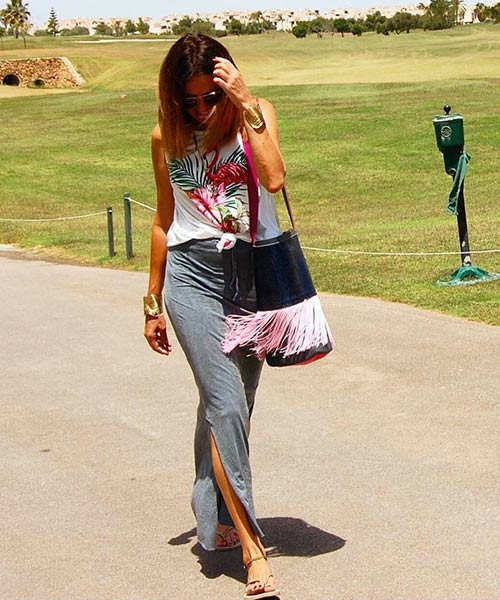 Wear your gray cotton maxi skirt with a printed sleevless top