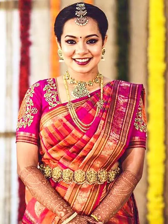 Kanjeevaram pattu saree with an embroidered blouse design