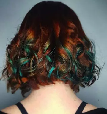 Emerald edged auburn hair color for women