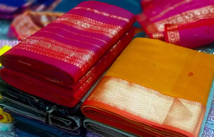 A bundle of silk sarees kept in a shop