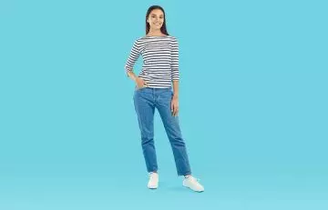 A woman in straight leg jeans