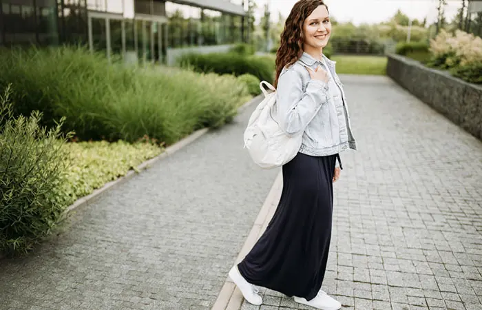 A woman dressed in an A-line maxi skirt