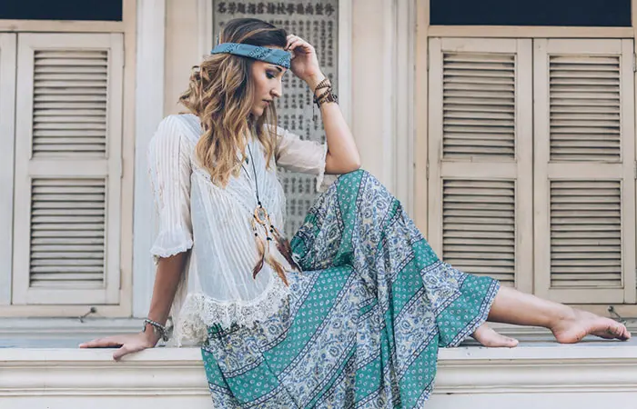 A woman dressed in a floral maxi skirt